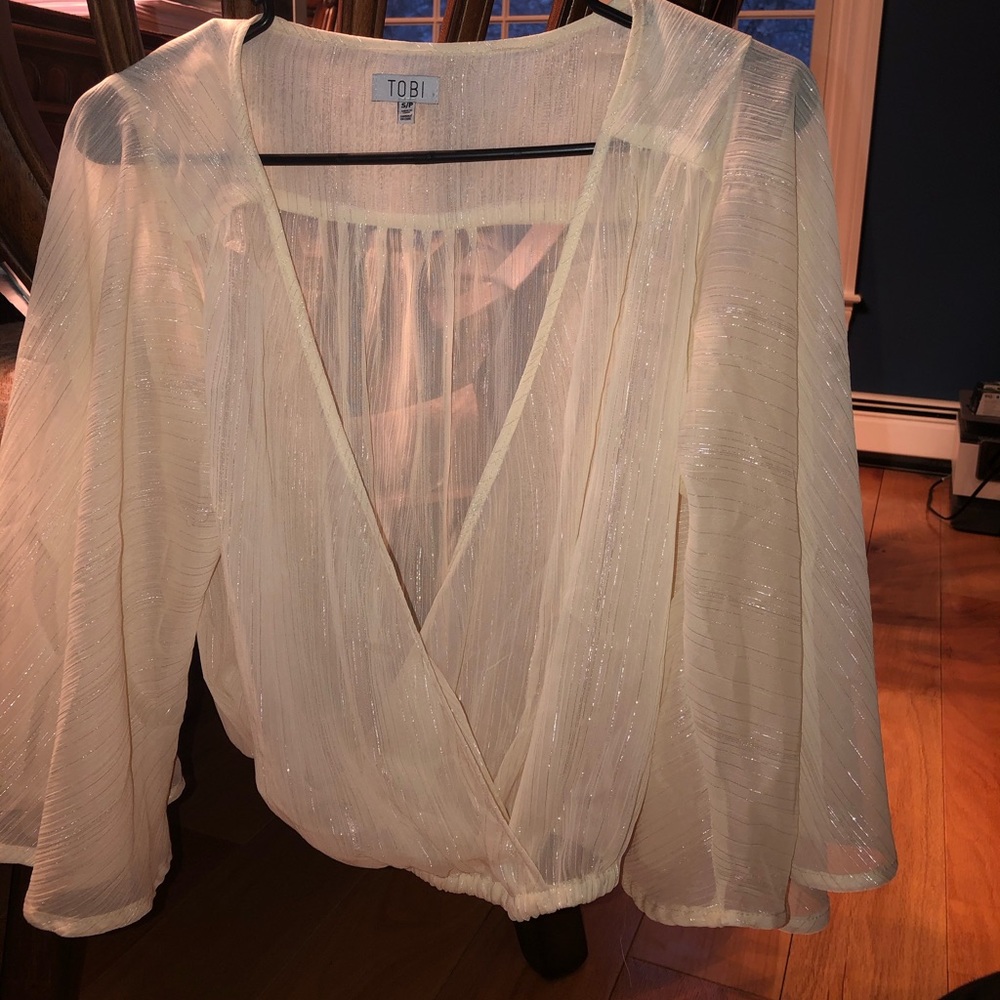 Never been worn White flowy sheer top by Tobi. Size Small